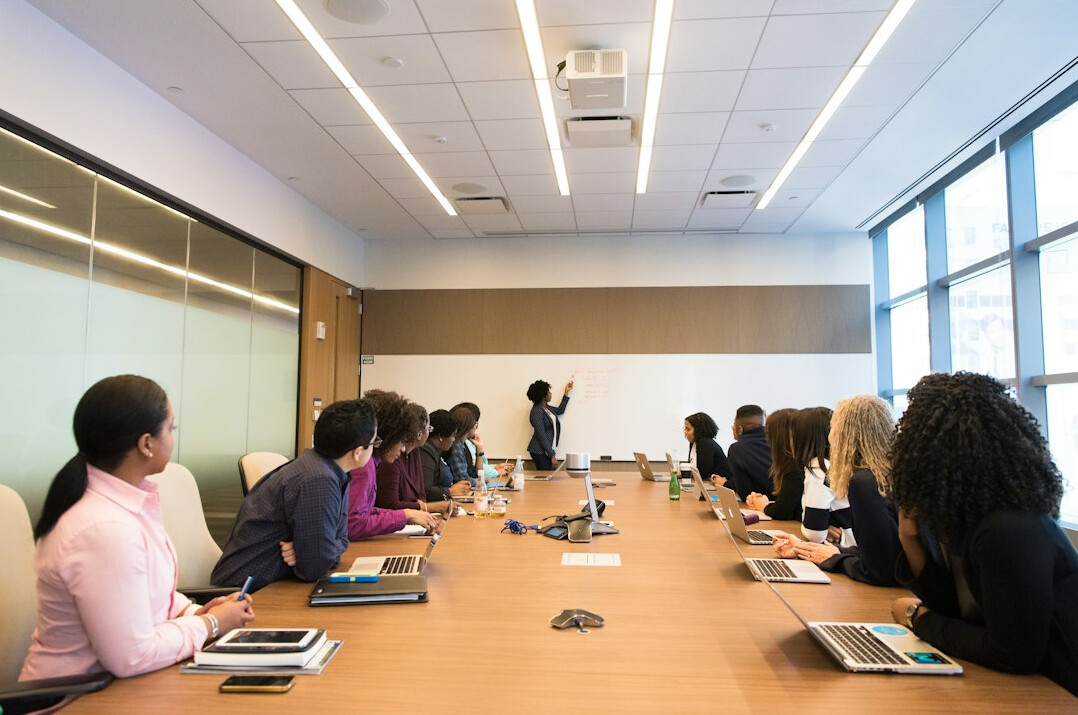 business professionals in meeting